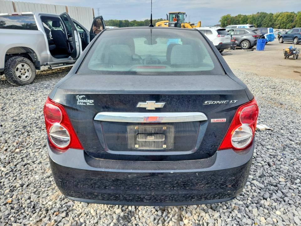 Снимка 6 от търг – 2013 CHEVROLET SONIC с VIN 1G1JC5SB9D4143902