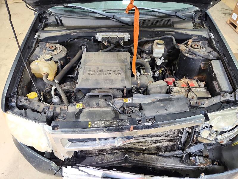 Photo 11 from auction – 2009 FORD ESCAPE with VIN 1FMCU04G69KA82404