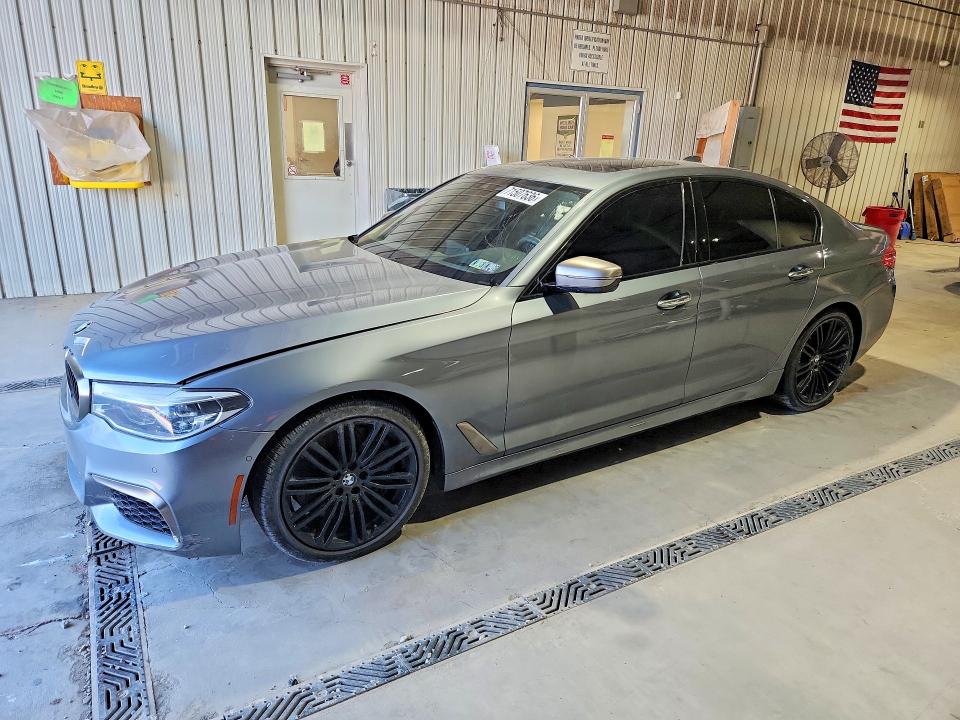 BMW M550XI 2018 with VIN WBAJB9C57JG463995 - Photo from auction