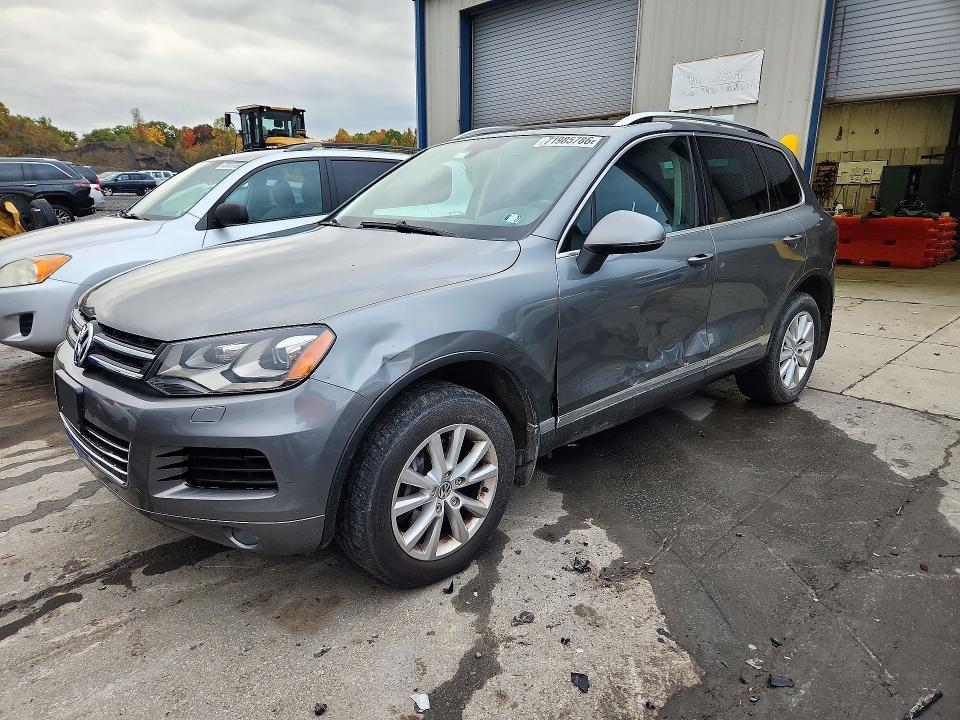 VOLKSWAGEN TOUAREG 2014 с VIN WVGEF9BP3ED013873 - Снимка от търг