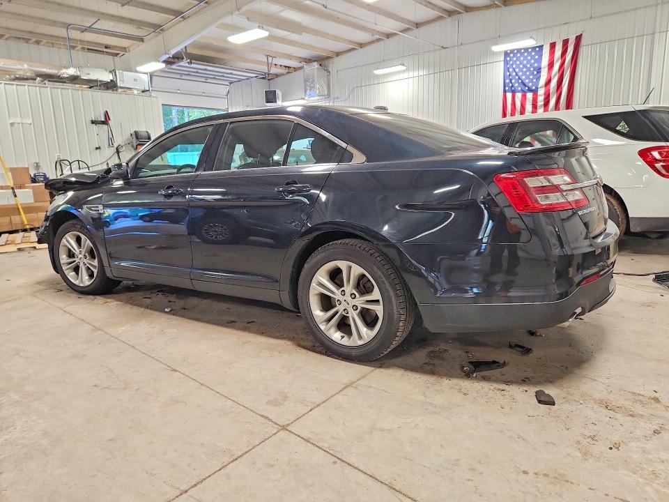 Снимка 2 от търг – 2014 FORD TAURUS с VIN 1FAHP2E89EG109019