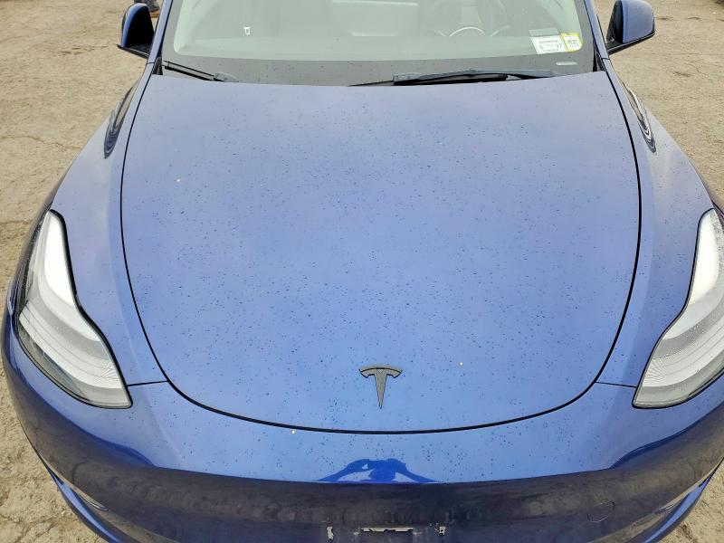 Photo 11 from auction – 2023 TESLA MODEL Y with VIN 7SAYGDEE8PF802997