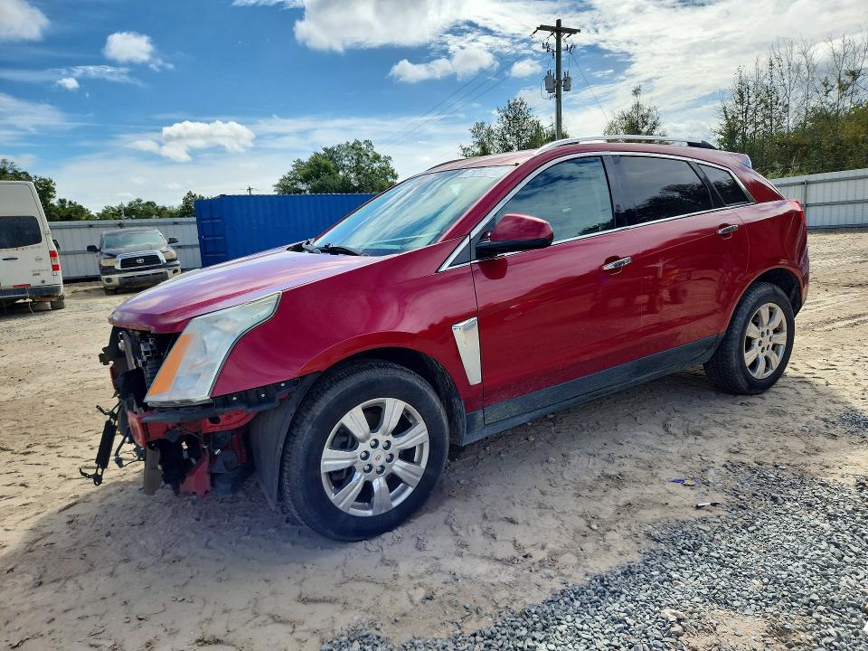 CADILLAC SRX 2015 with VIN 3GYFNBE3XFS528232 - Photo from auction