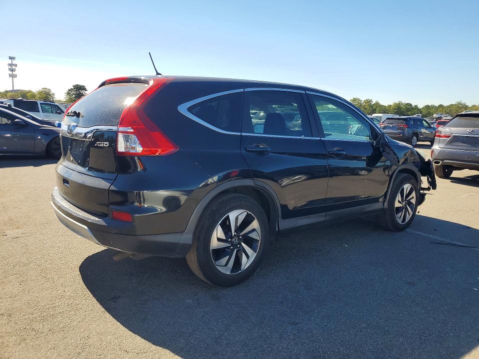 Photo 3 from auction – 2016 HONDA CR-V with VIN 2HKRM4H58GH634740