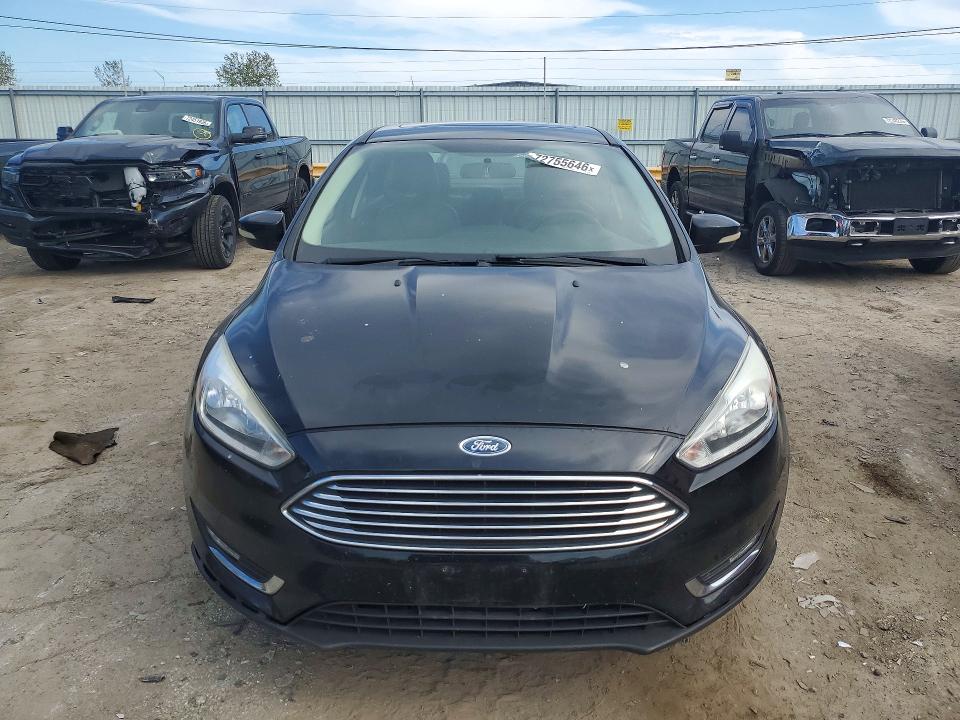 Снимка 5 от търг – 2018 FORD FOCUS с VIN 1FADP3J20JL276103