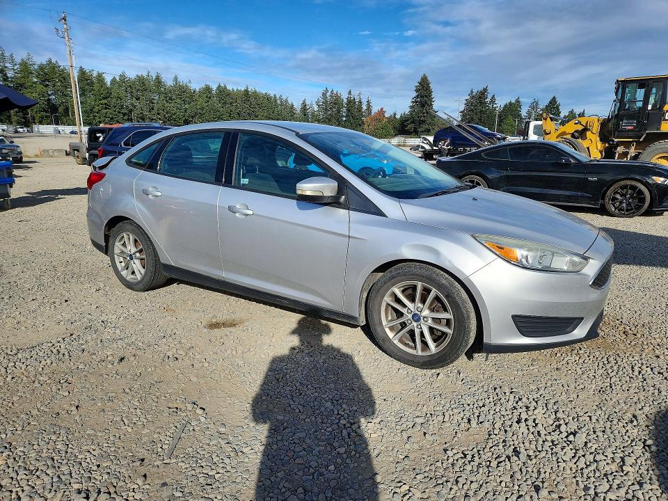 Photo 4 from auction – 2015 FORD FOCUS with VIN 1FADP3F20FL241786