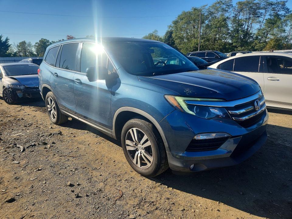 Photo 4 from auction – 2016 HONDA PILOT with VIN 5FNYF6H57GB105957