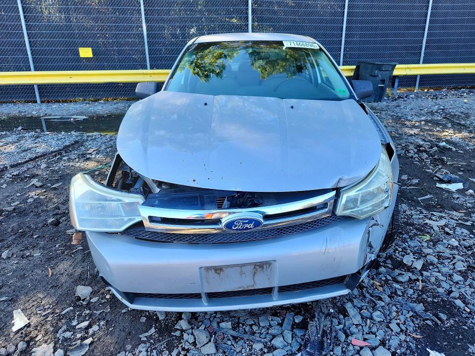 Снимка 5 от търг – 2009 FORD FOCUS с VIN 1FAHP35N69W246216