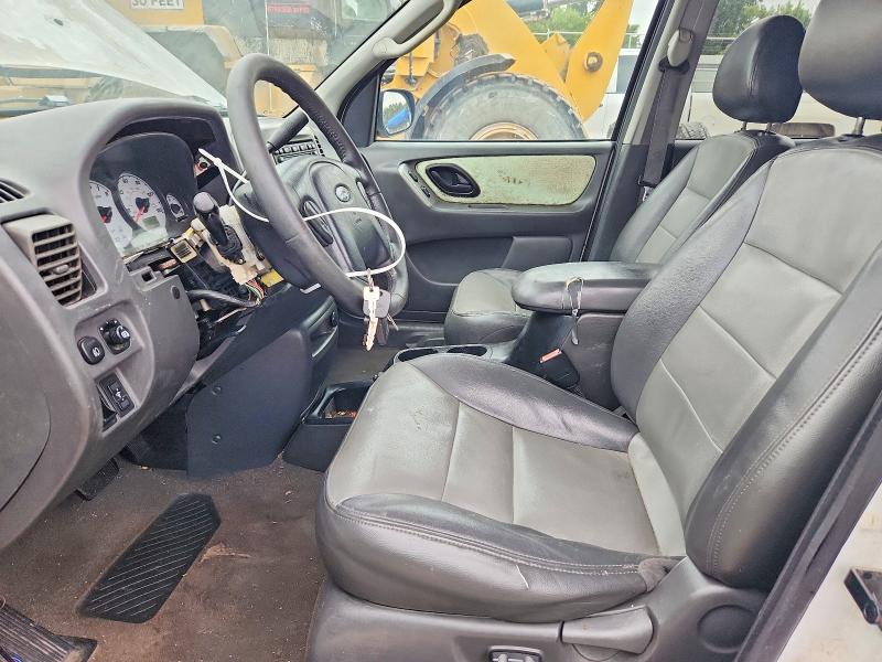 Снимка 7 от търг – 2003 FORD ESCAPE с VIN 1FMYU93183KC05473