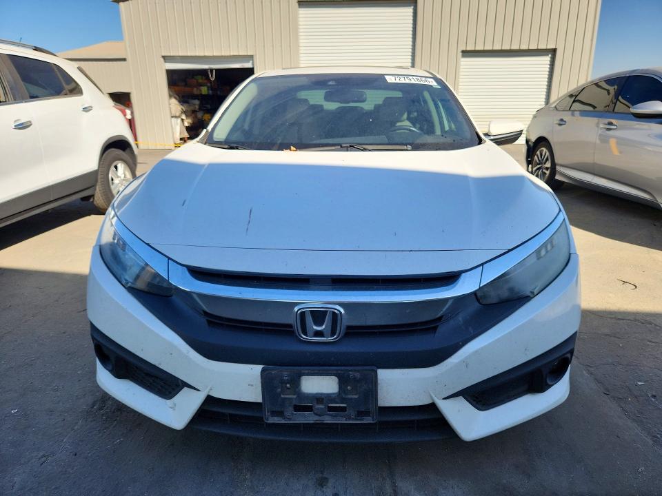 Photo 5 from auction – 2016 HONDA CIVIC with VIN 19XFC1F93GE219694