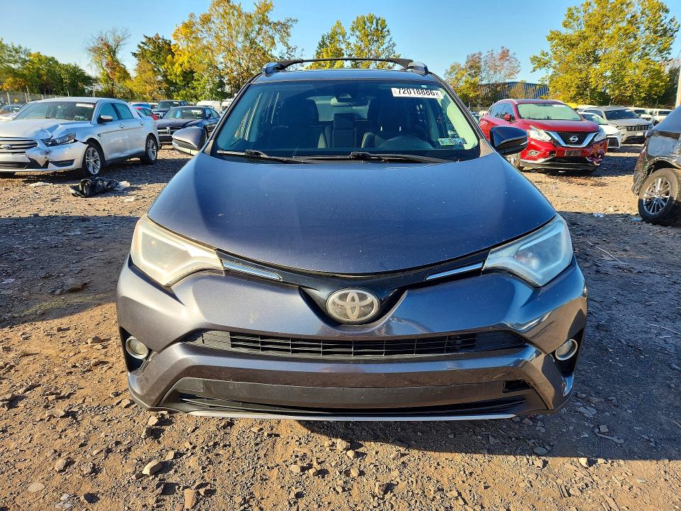 Photo 5 from auction – 2017 TOYOTA RAV4 with VIN JTMRFREV2HD202860