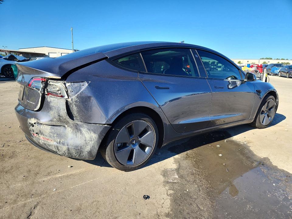 Photo 3 from auction – 2023 TESLA MODEL 3 with VIN 5YJ3E1EB3PF670538