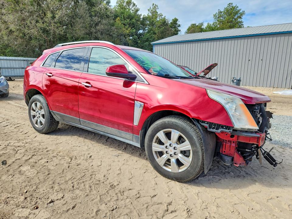 Photo 4 from auction – 2015 CADILLAC SRX with VIN 3GYFNBE3XFS528232