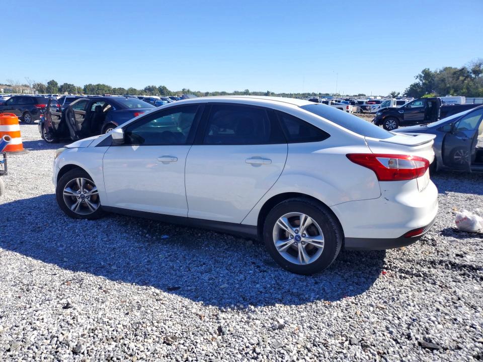 Снимка 2 от търг – 2012 FORD FOCUS с VIN 1FAHP3F23CL303419