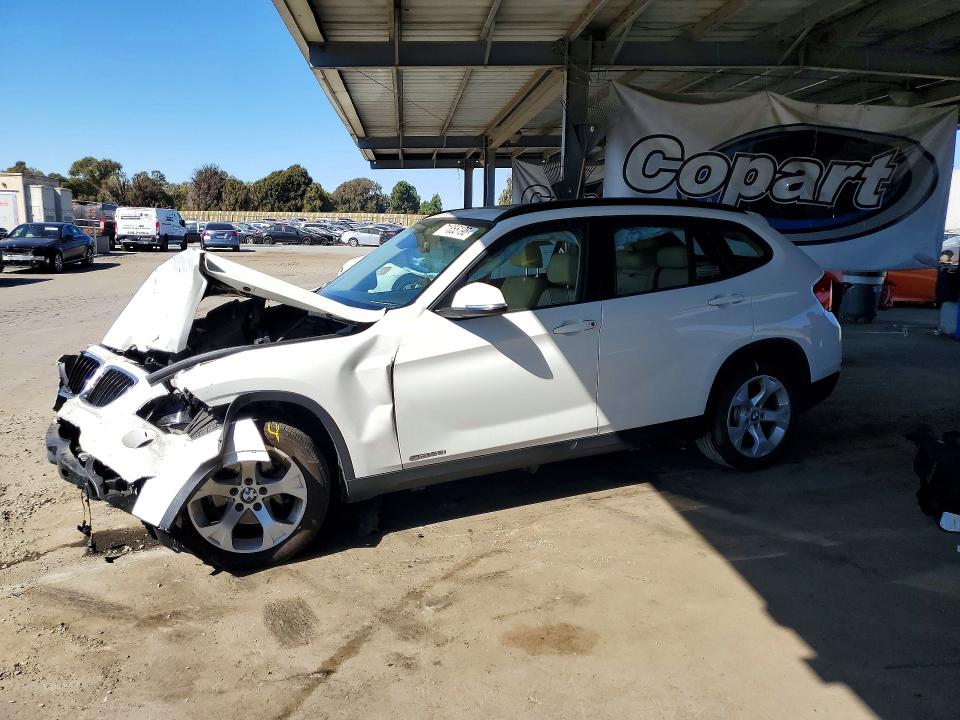 BMW X1 2015 с VIN WBAVM1C53FV318839 - Снимка от търг
