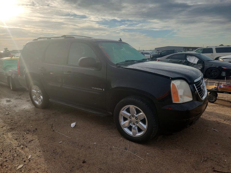 Снимка 4 от търг – 2007 GMC YUKON с VIN 1GKFC13097R357304