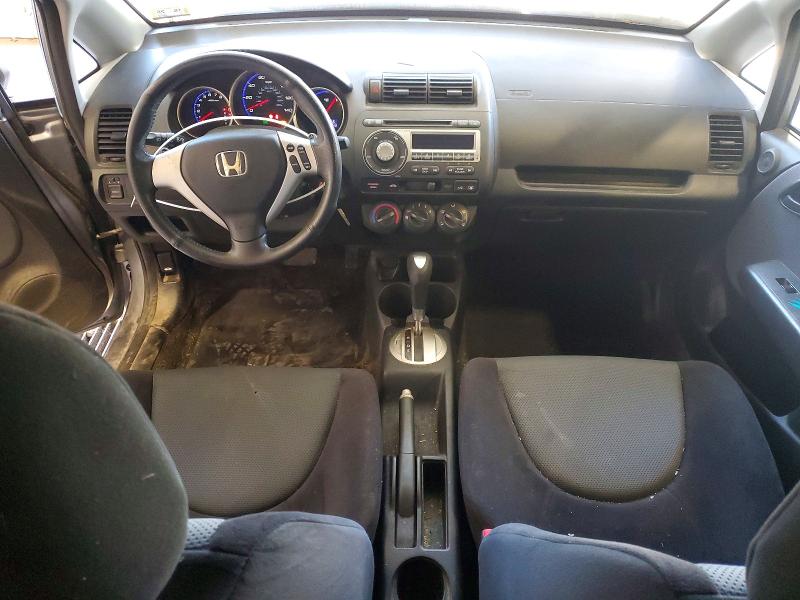 Снимка 8 от търг – 2008 HONDA FIT с VIN JHMGD38638S042867