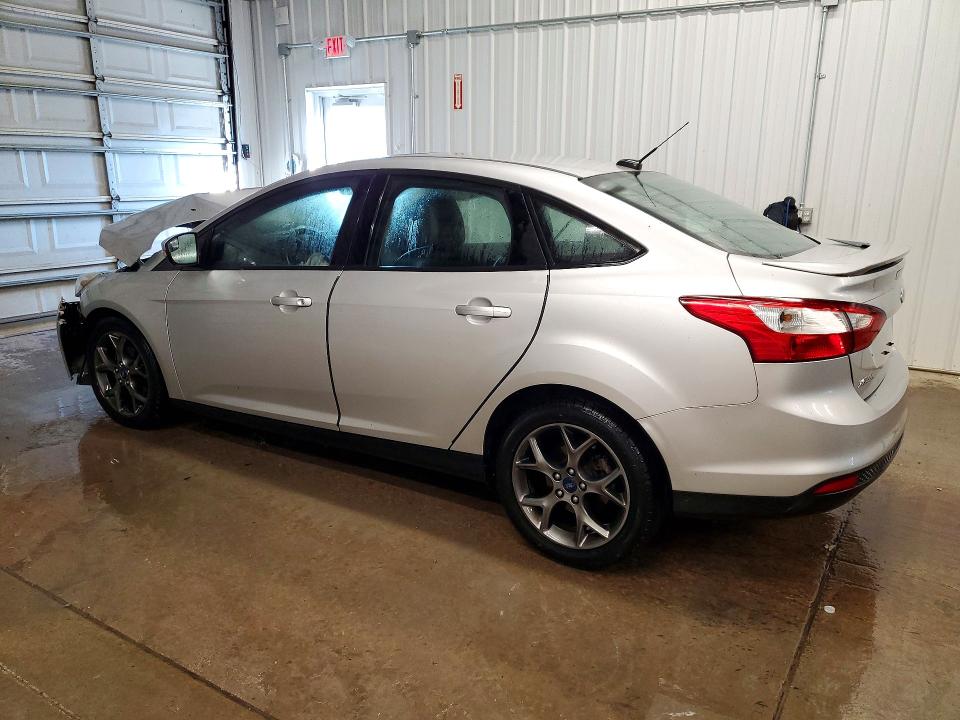 Снимка 2 от търг – 2013 FORD FOCUS с VIN 1FADP3F22DL297385