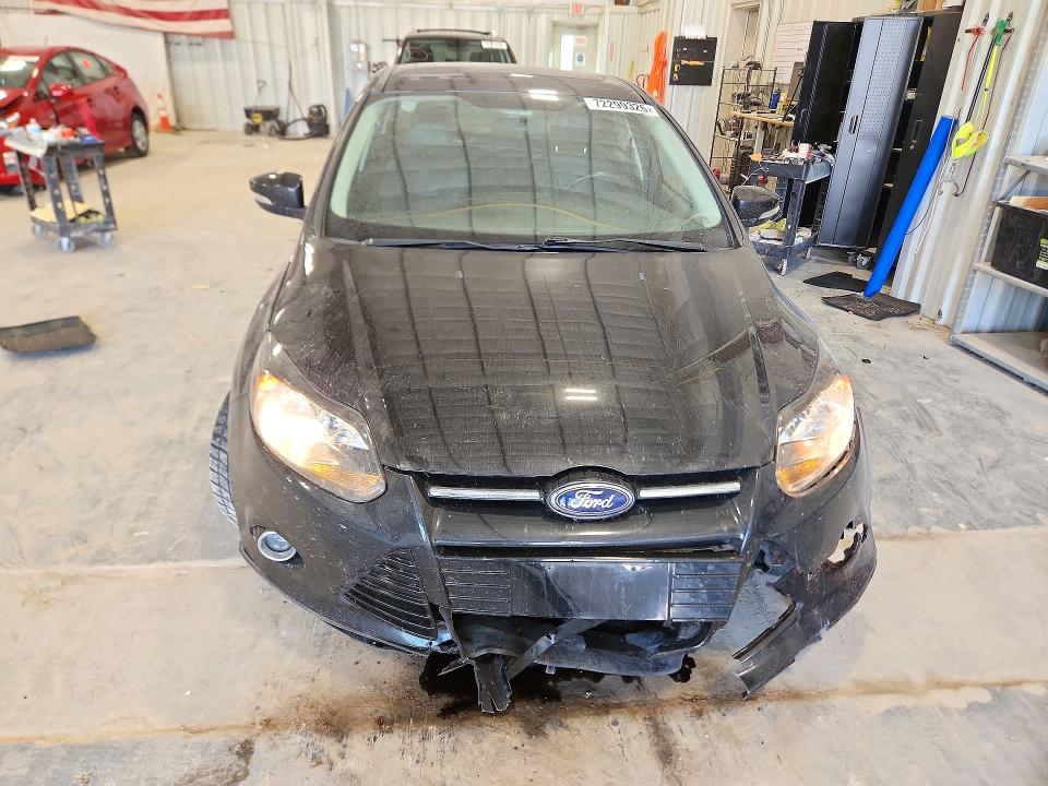 Foto 5 de la subasta – 2014 FORD FOCUS con VIN 1FADP3J22EL105181