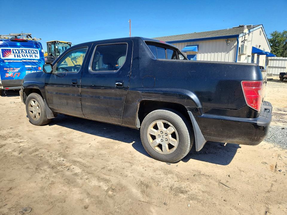 Photo 2 from auction – 2011 HONDA RIDGELINE with VIN 5FPYK1F49BB453574