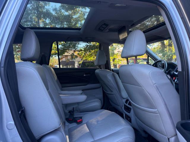 Снимка 6 от търг – 2016 HONDA PILOT с VIN 5FNYF6H07GB018189