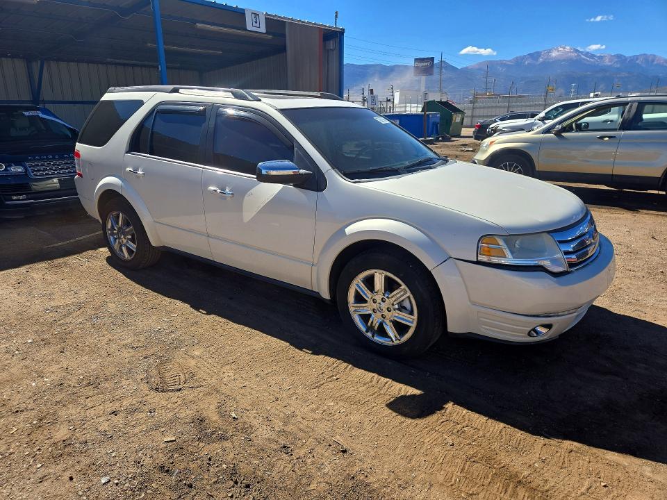 Фото 4 с аукциона – 2009 FORD TAURUS X с VIN 1FMDK03W59GA01396