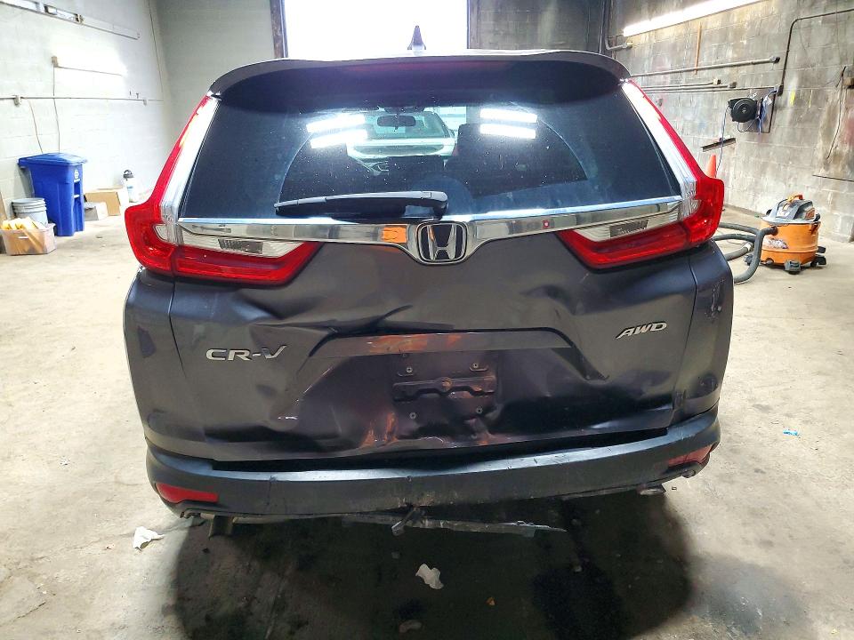 Photo 6 from auction – 2018 HONDA CR-V with VIN 7FARW2H51JE088713