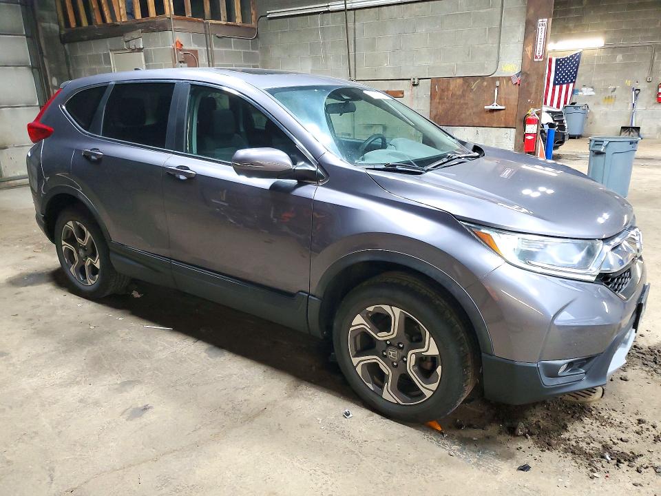 Photo 4 from auction – 2018 HONDA CR-V with VIN 7FARW2H51JE088713