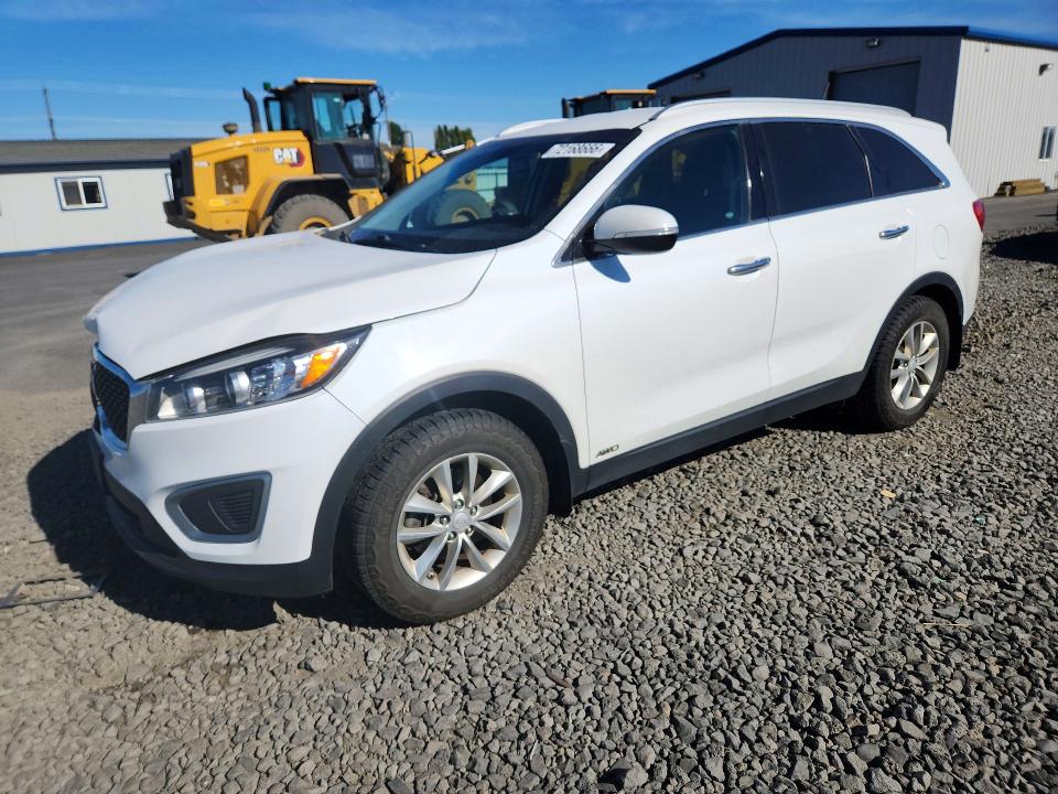 KIA SORENTO 2016 con VIN 5XYPGDA39GG164734 - Foto de la subasta