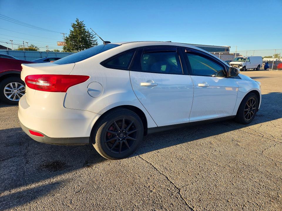 Foto 3 de la subasta – 2017 FORD FOCUS con VIN 1FADP3FE9HL315297