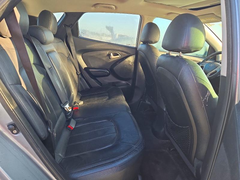 Снимка 11 от търг – 2011 HYUNDAI TUCSON с VIN KM8JUCAC2BU227362