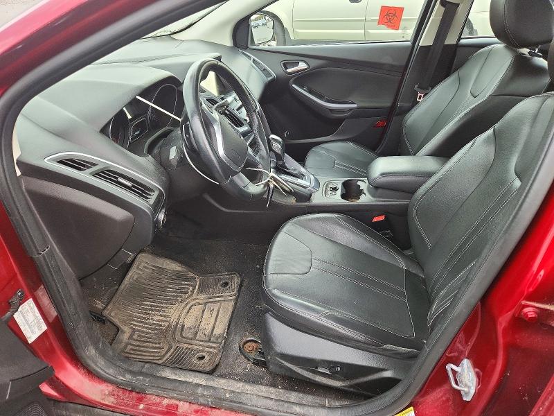 Снимка 7 от търг – 2014 FORD FOCUS с VIN 1FADP3J24EL215133