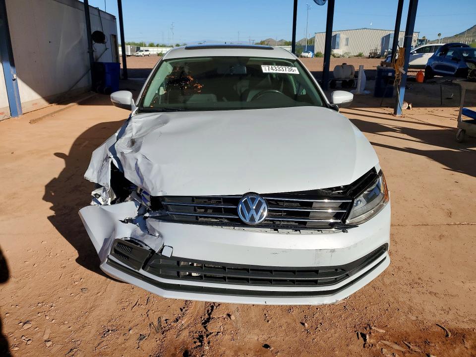 Снимка 5 от търг – 2017 VOLKSWAGEN JETTA с VIN 3VWDB7AJ8HM406495