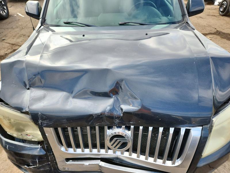 Снимка 12 от търг – 2009 MERCURY MARINER с VIN 4M2CU97G19KJ00953