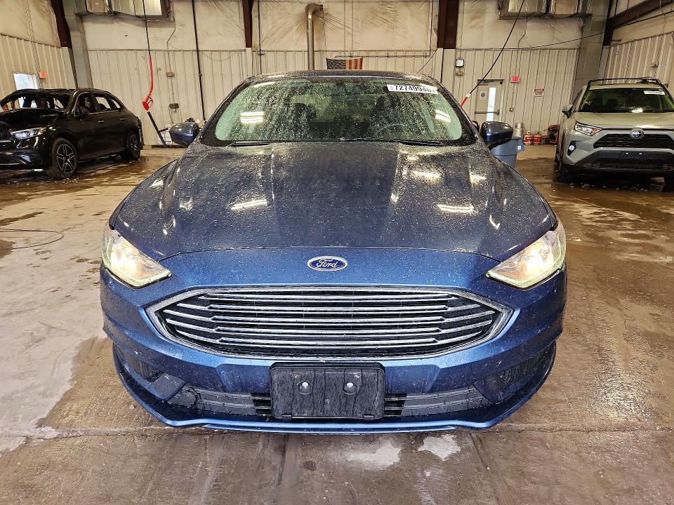 Photo 5 from auction – 2018 FORD FUSION with VIN 3FA6P0LU9JR232396