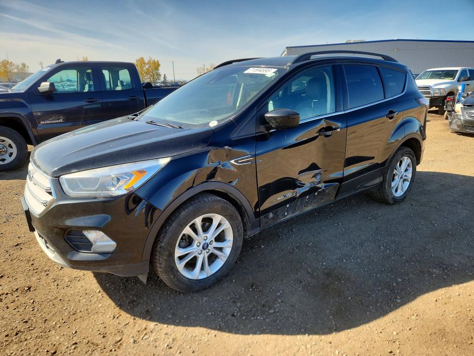 Снимка 1 от търг – 2018 FORD ESCAPE с VIN 1FMCU0HDXJUB65018