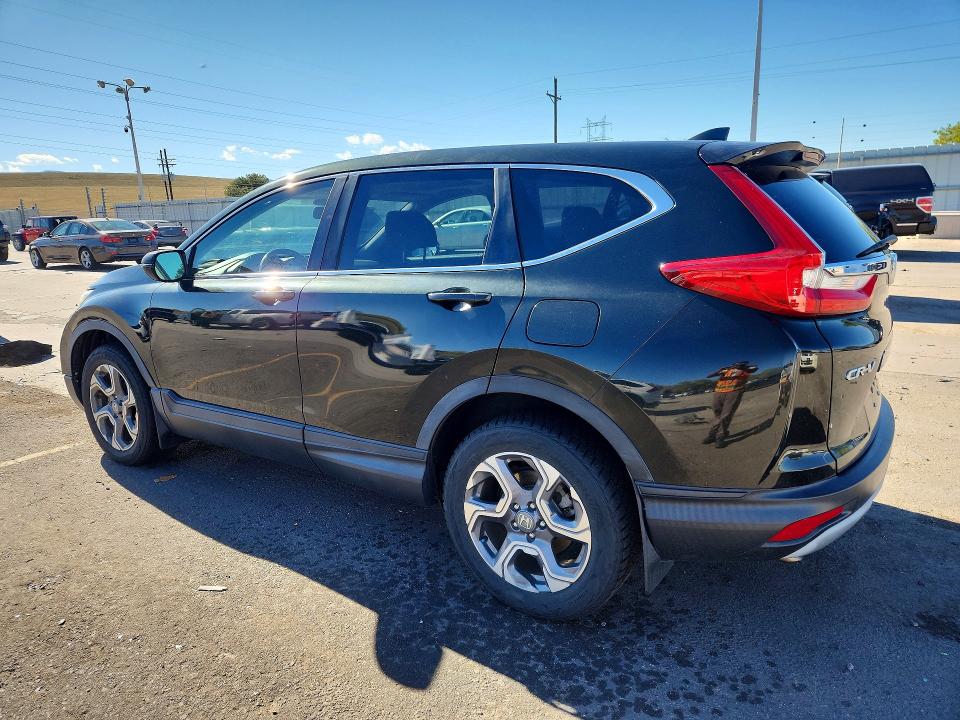 Photo 2 from auction – 2018 HONDA CR-V with VIN 7FARW2H82JE102564