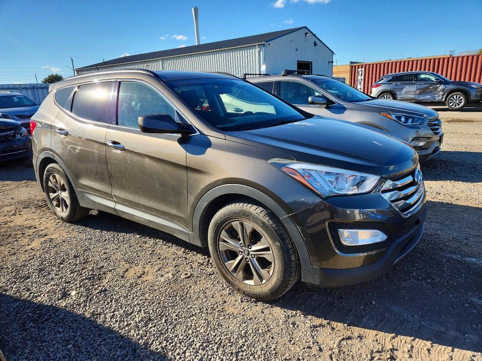 Снимка 4 от търг – 2014 HYUNDAI SANTA FE SPORT с VIN 5XYZUDLB7EG211021