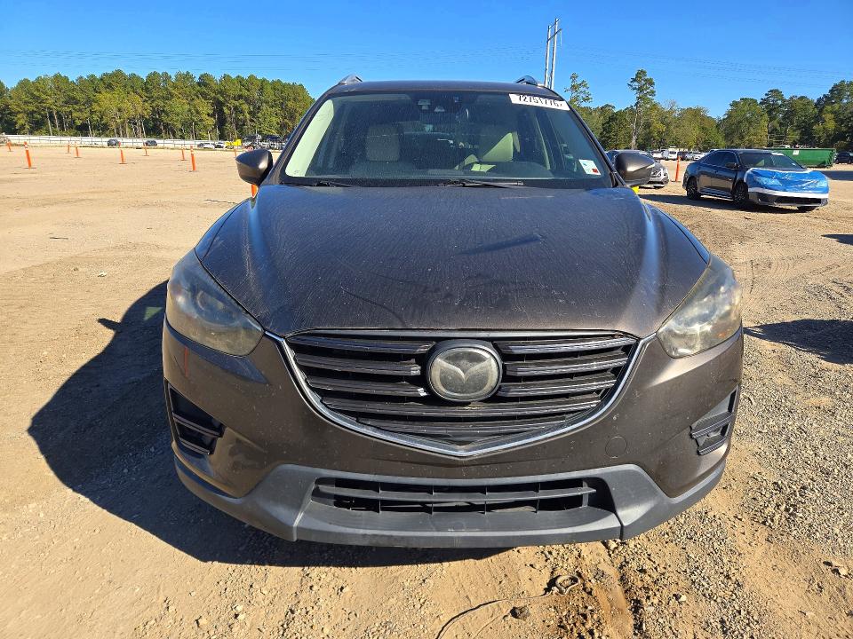 Снимка 5 от търг – 2016 MAZDA CX-5 с VIN JM3KE2DY3G0668916