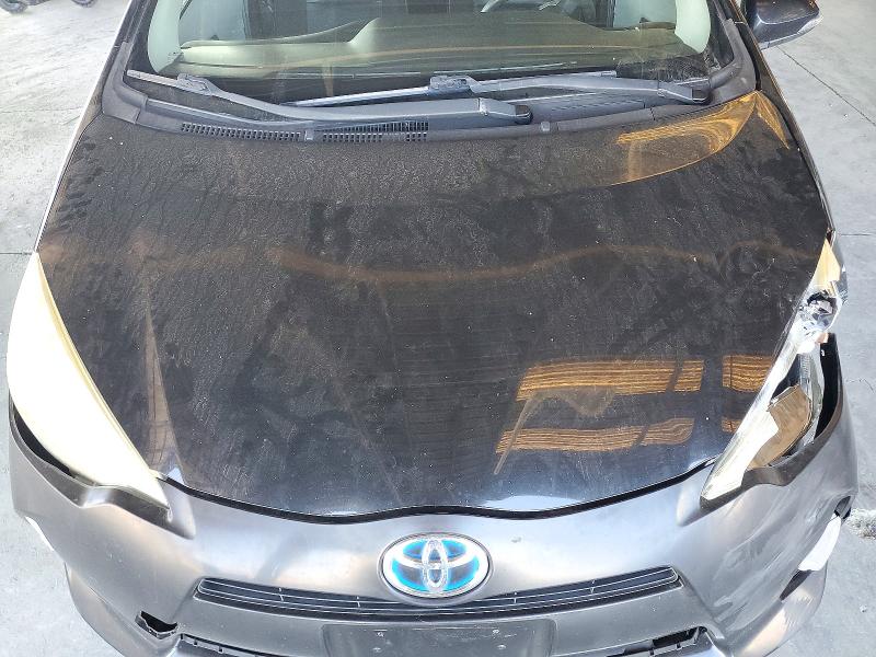 Снимка 11 от търг – 2012 TOYOTA PRIUS C с VIN JTDKDTB35C1017560