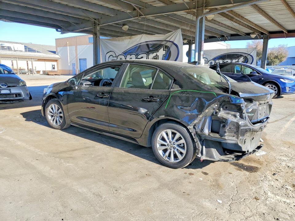 Снимка 2 от търг – 2023 TOYOTA COROLLA HYBRID с VIN JTDBCMFE0P3010871