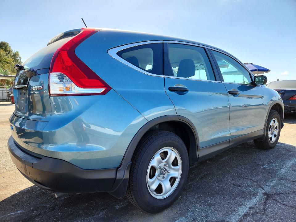 Photo 3 from auction – 2014 HONDA CR-V with VIN 2HKRM4H38EH699017