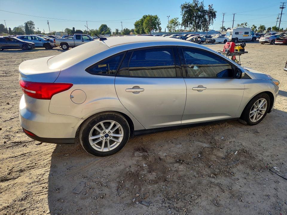 Photo 3 from auction – 2015 FORD FOCUS with VIN 1FADP3F25FL257191