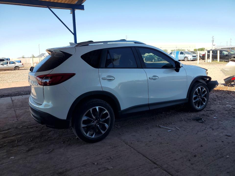 Photo 3 from auction – 2016 MAZDA CX-5 with VIN JM3KE2DY2G0904262