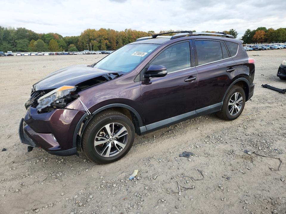 TOYOTA RAV4 2018 с VIN 2T3RFREV0JW696502 - Снимка от търг
