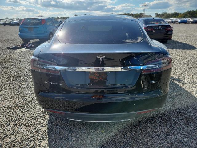 Снимка 6 от търг – 2015 TESLA MODEL S с VIN 5YJSA1S28FF085819