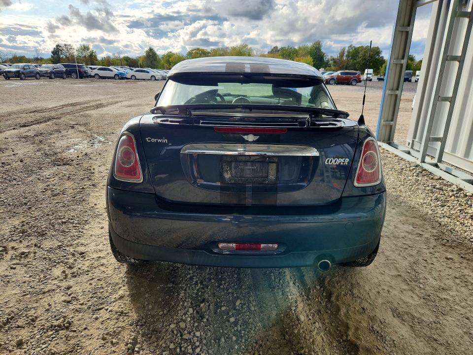 Снимка 6 от търг – 2014 MINI COOPER COUPE с VIN WMWSX1C57ET507997