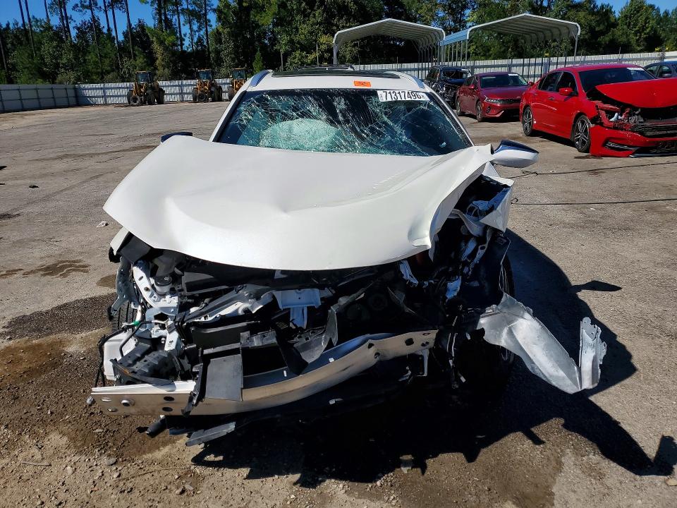 Снимка 5 от търг – 2024 LEXUS UX 250H с VIN JTHP6JBH5R2179741