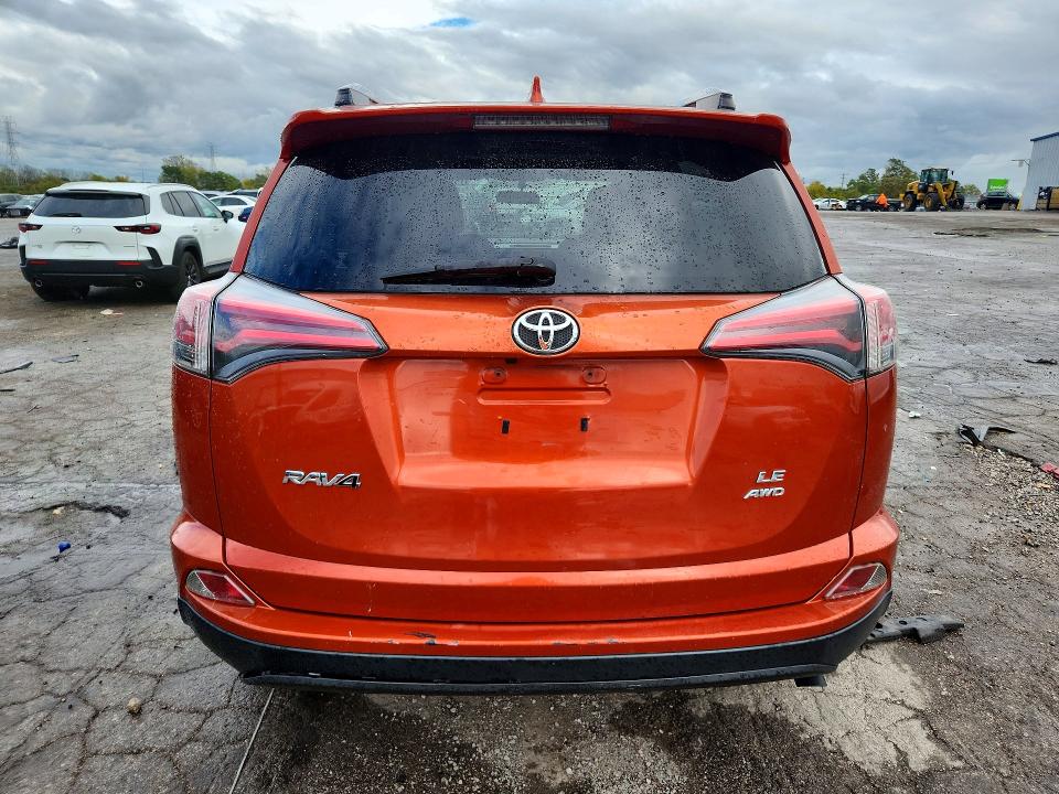 Photo 6 from auction – 2016 TOYOTA RAV4 with VIN JTMBFREV9GJ059116