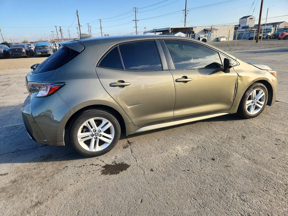 Снимка 3 от търг – 2019 TOYOTA COROLLA HATCHBACK с VIN JTNK4RBE1K3034634